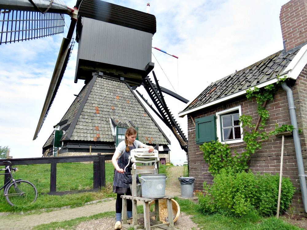 The miller's wife is doing the laundry at Windmill museum Blokweer