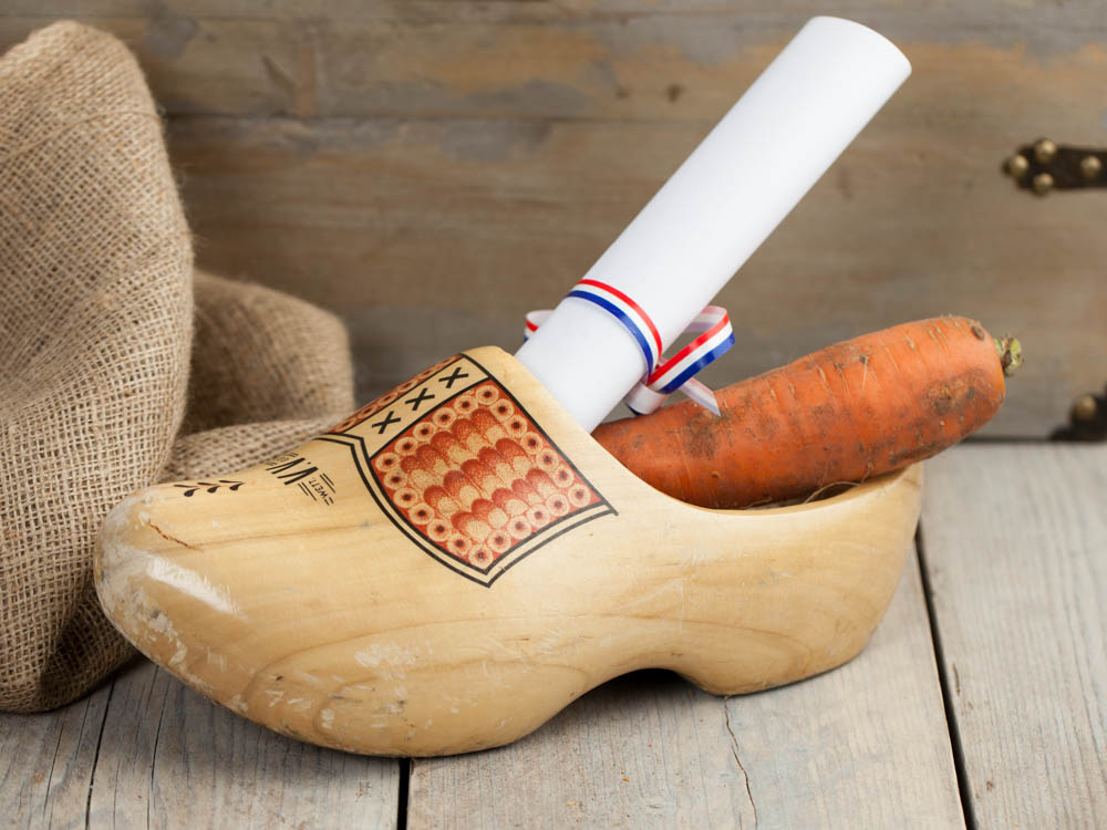 A wooden shoe filled with a drawing and a carrot for Sinterklaas and his horse Amerigo