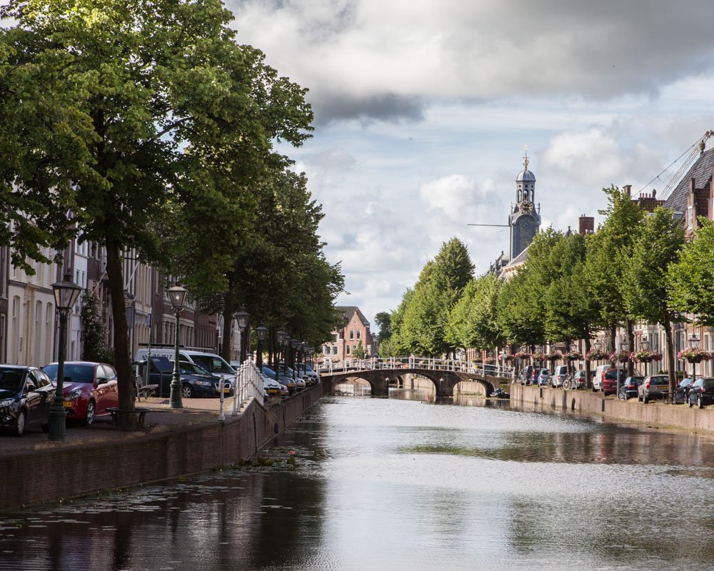 Rapenburg canal in Leiden. In the background, the university tower. The university where Rembrandt was once enrolled.
