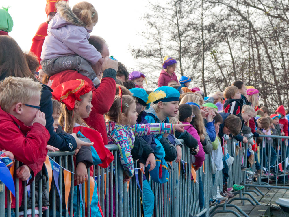 Children waiting full of excitement for the arrival of Sinterklaas and his Black Petes